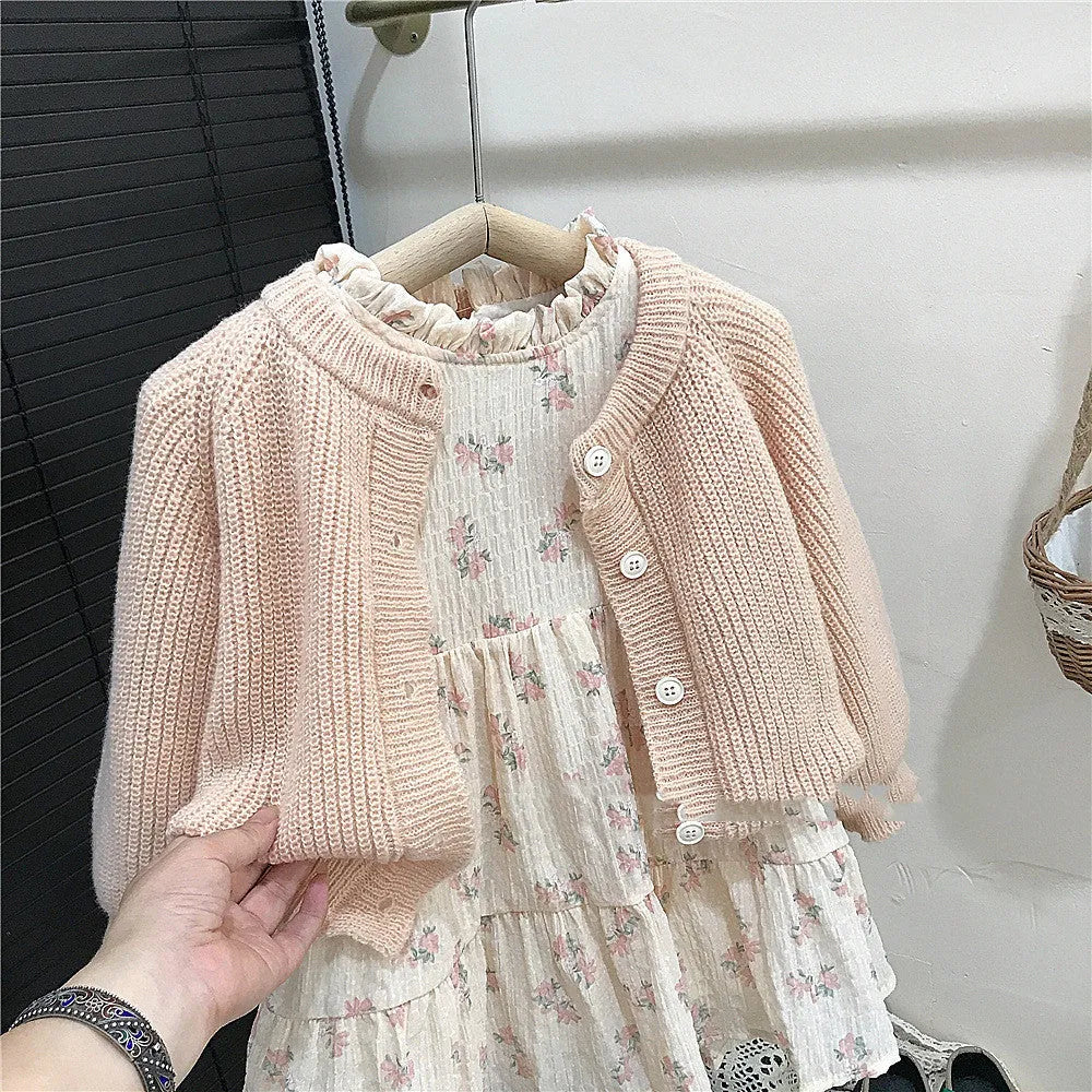 Girls' pink mohair puff sleeve knitted cardigan with orange flower chiffon dress set on white background