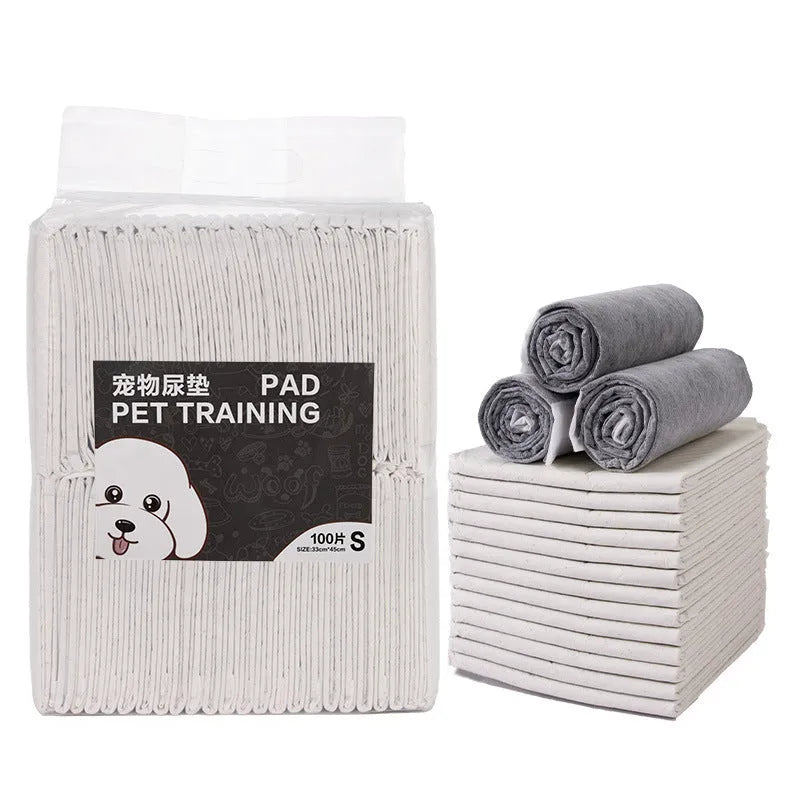 Pack of pet urinal pads showing bamboo charcoal variant in multiple sizes for dogs and cats