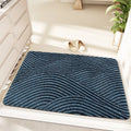 Green alien-shaped diatom earth bath mat with cartoon anime pattern, size 60cm by 90cm.