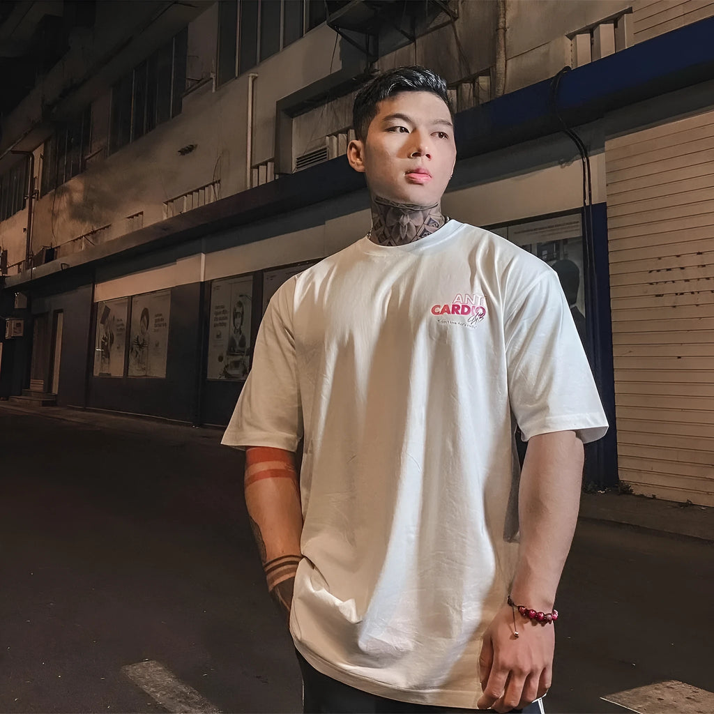 Men's cotton loose fit athletic T-shirt with half sleeves and round collar in black or white, sizes L to 3XL