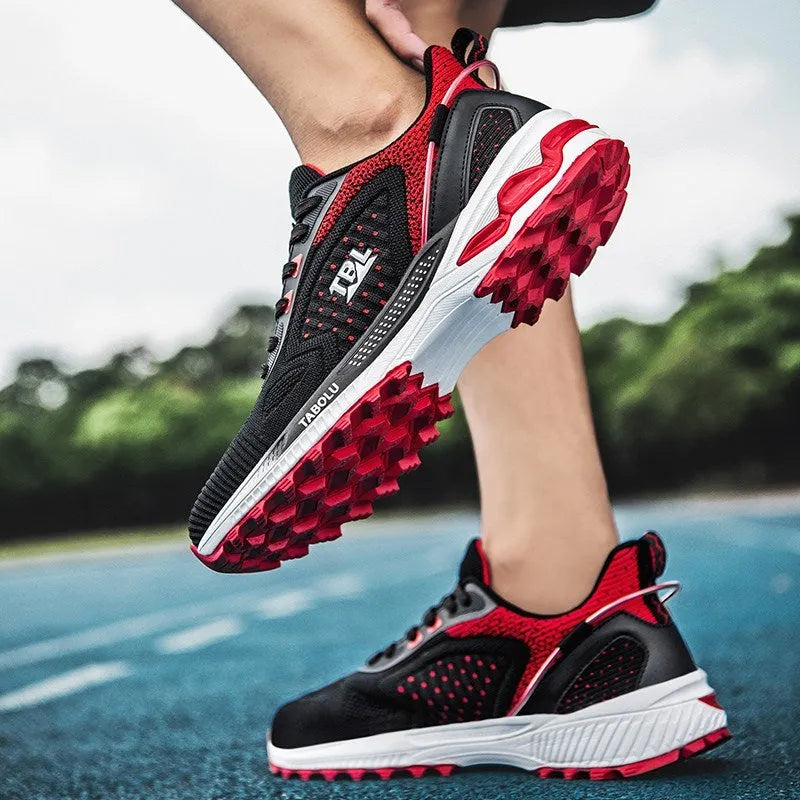 Junior high school running shoes with non-slip rubber sole and mesh upper, side view, in Black Grey colour