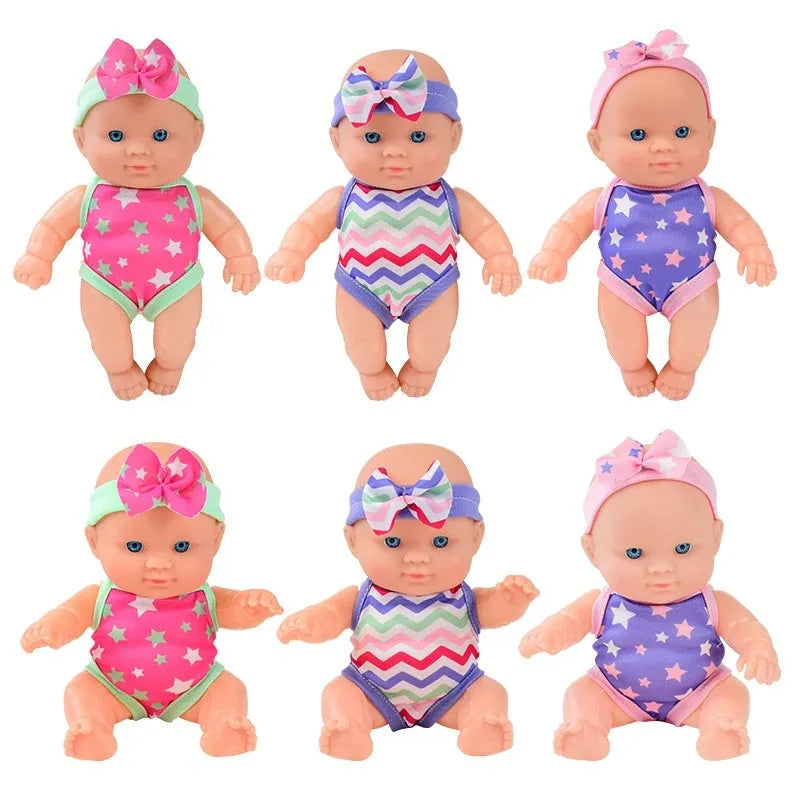 Vinyl baby figurine doll in presentation box, 21.5 cm tall, available in six colours.
