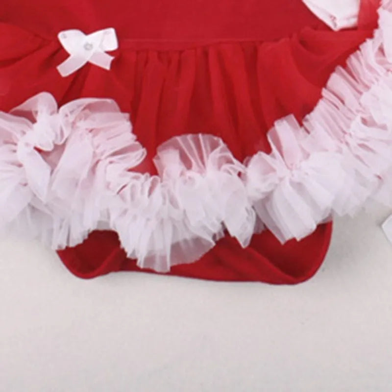 Four-piece newborn clothing set with cotton romper, headband, socks and shoes on display