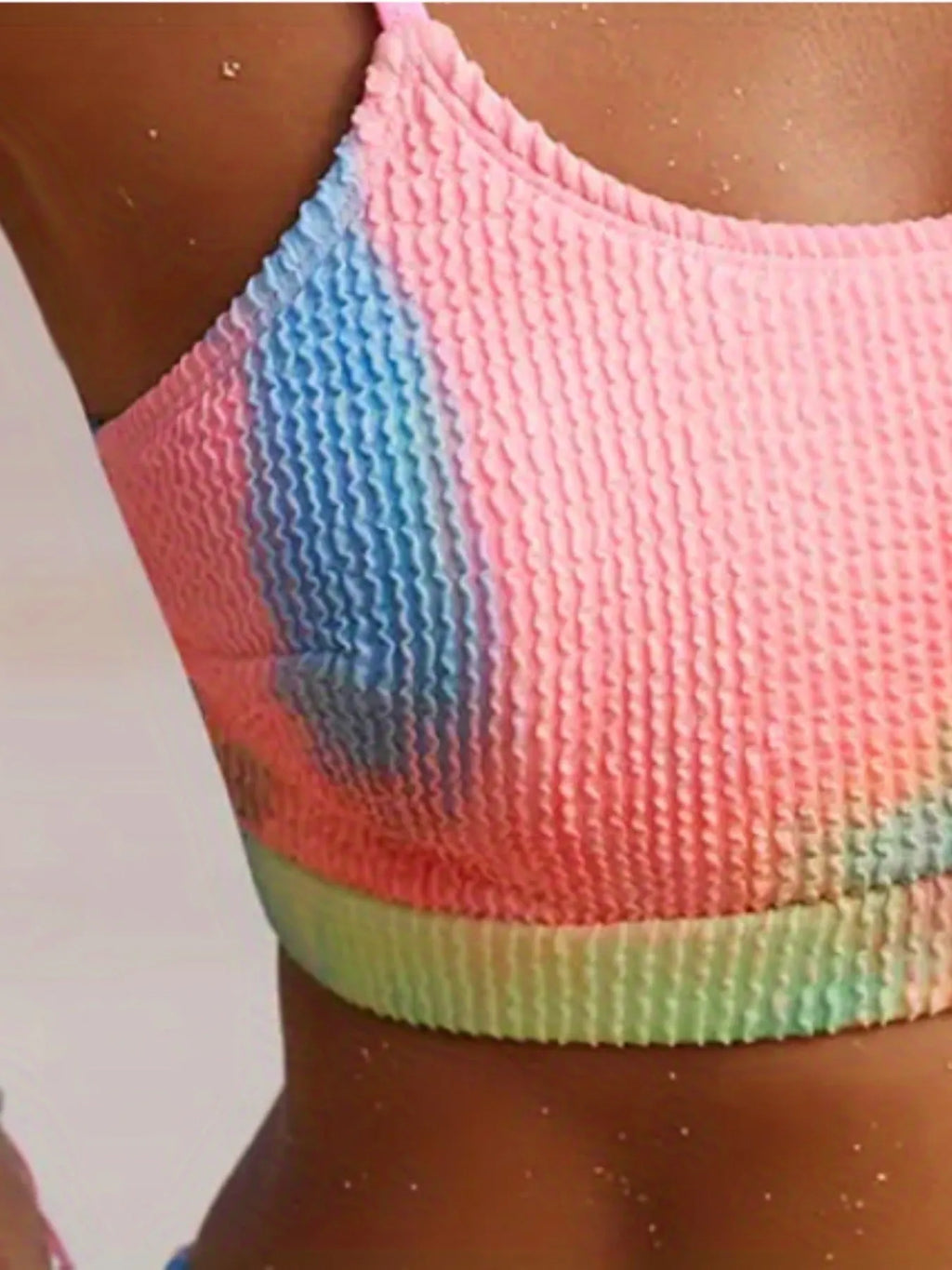 Women's tie-dye pleated split bikini in blue and orange gradient patterns with high elasticity polyester construction