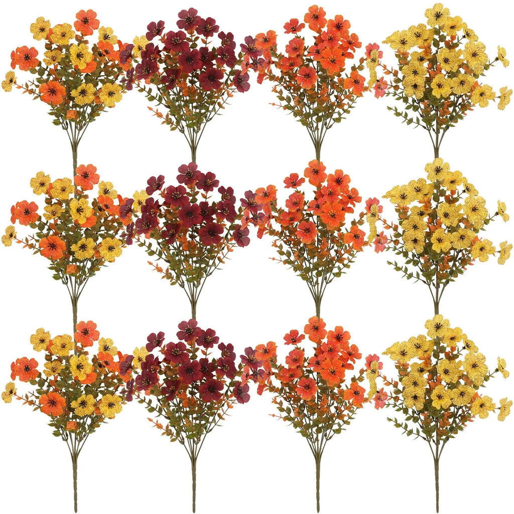 Artificial flower bouquet with autumn orange, red, and yellow silk flowers on plastic stems for decoration
