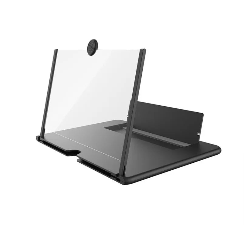 Black foldable phone screen amplifier with fenier lens, 3-4x magnification, on a table