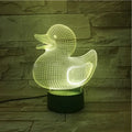 3D yellow duck shaped LED night light with remote control on a table