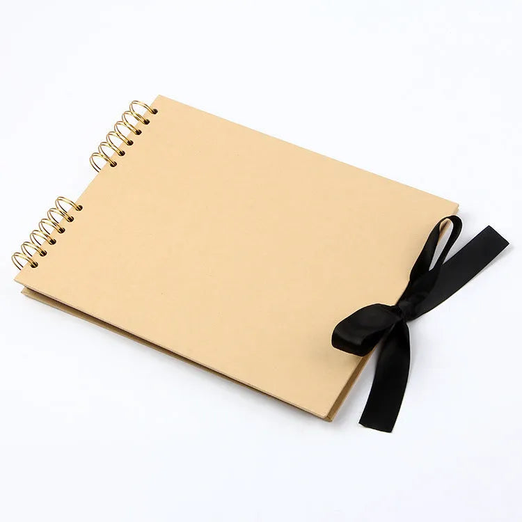 DIY handmade photo album with coil spiral binding in yellow or black cover measuring 290mm by 215mm
