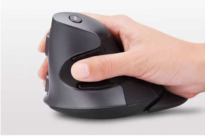 Black and white M 618 wireless vertical ergonomic mouse with USB receiver on a wooden desk.