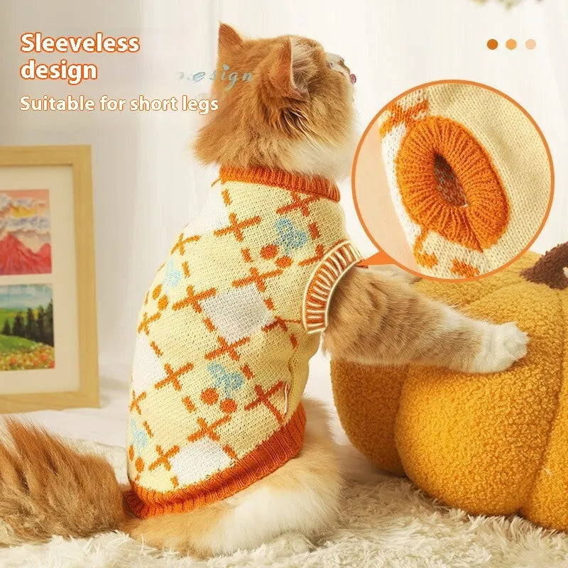 Orange diamond knit cat jumper showing chest measurement points and size labels