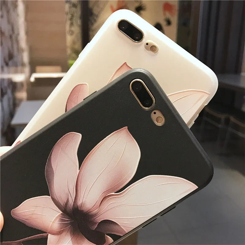 Embossed iPhone case with flower design in black TPU material showing textured back surface