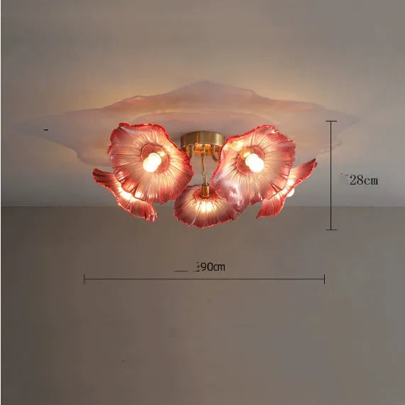 Modern ceiling lamp with cluster of artificial white flowers and warm glowing light.