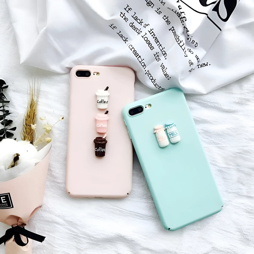 Soft silicone TPU iPhone case with a 3D cartoon cat design, shown in pink.