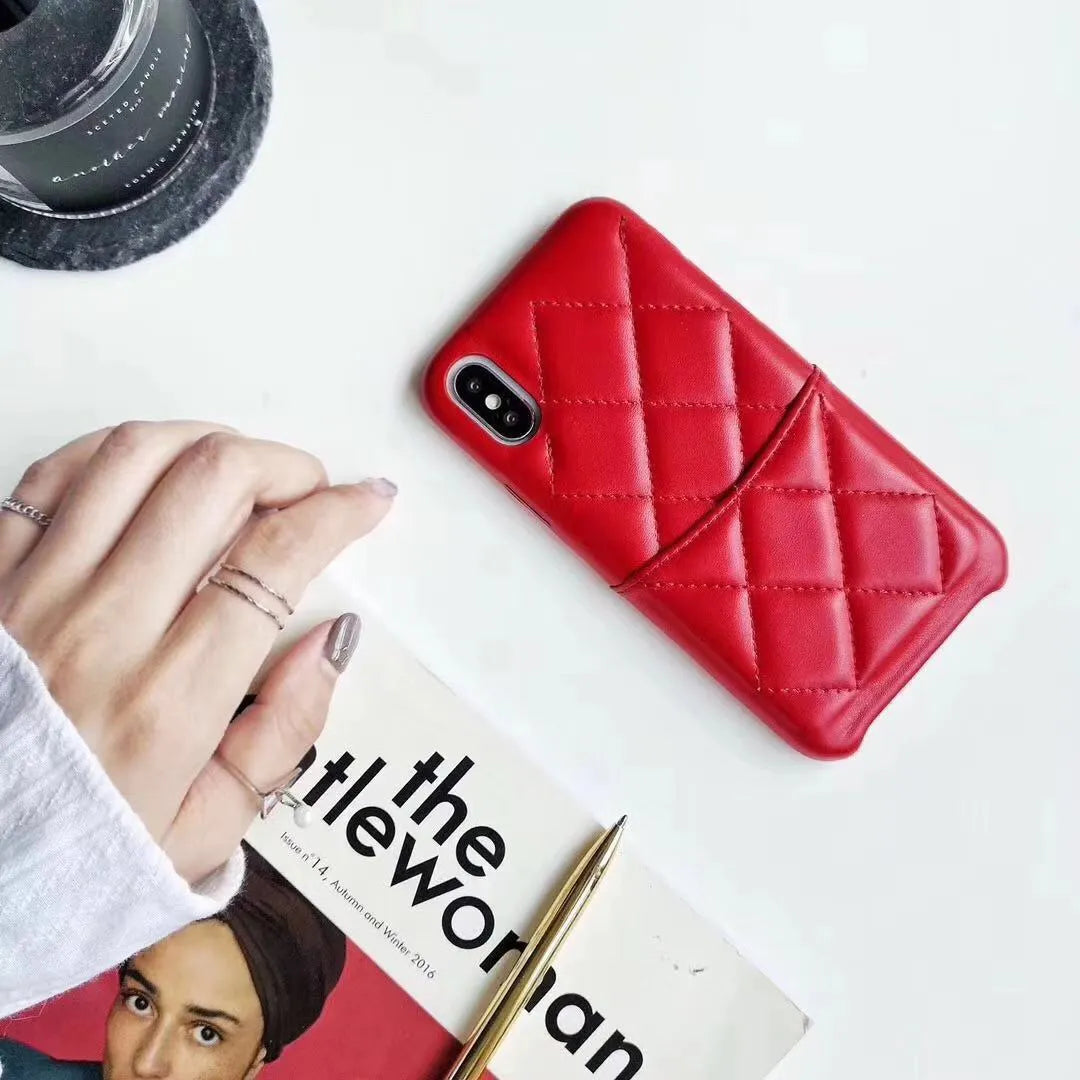 Black leather phone case for iPhone XS Max on a table