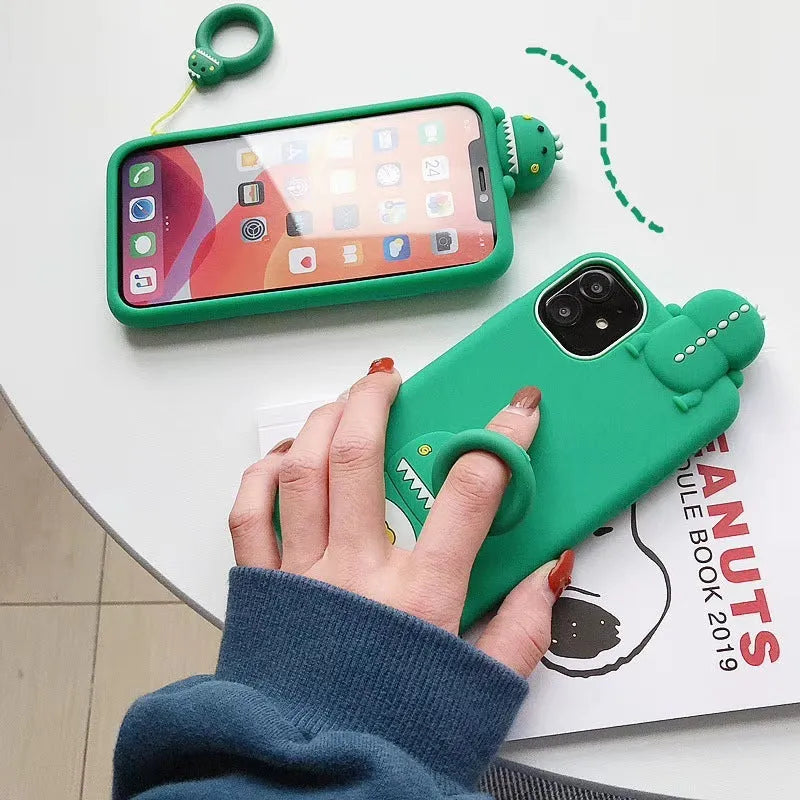 Green silicone iPhone case with animal cartoon design showing back cover protection