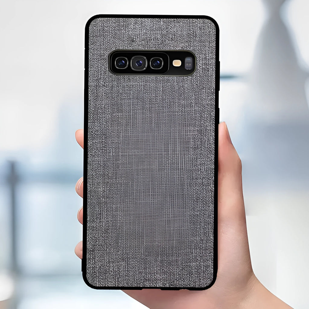Canvas patterned mobile phone case for Samsung Galaxy models on a table.