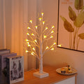 60cm tall white LED birch tree lamp with 24 small plastic mushroom-shaped warm white lights.