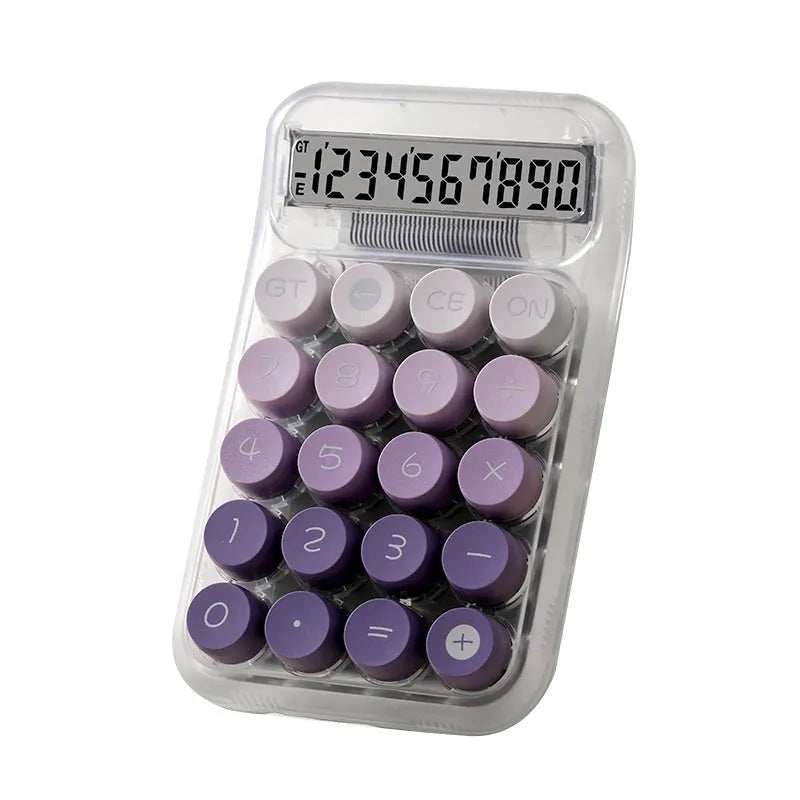 Round gradient colour mechanical keyboard calculator in mute blue, green, pink, or purple on a desk.