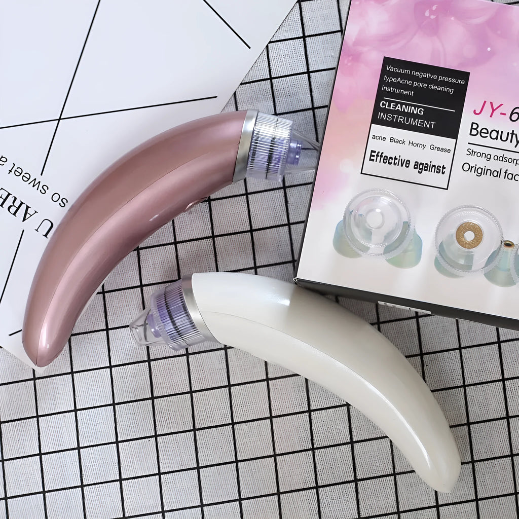 Rose gold and white electric blackhead suction instrument for facial skincare