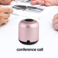 Hieha XQ11 cylindrical metal wireless Bluetooth speaker in various colours on a surface