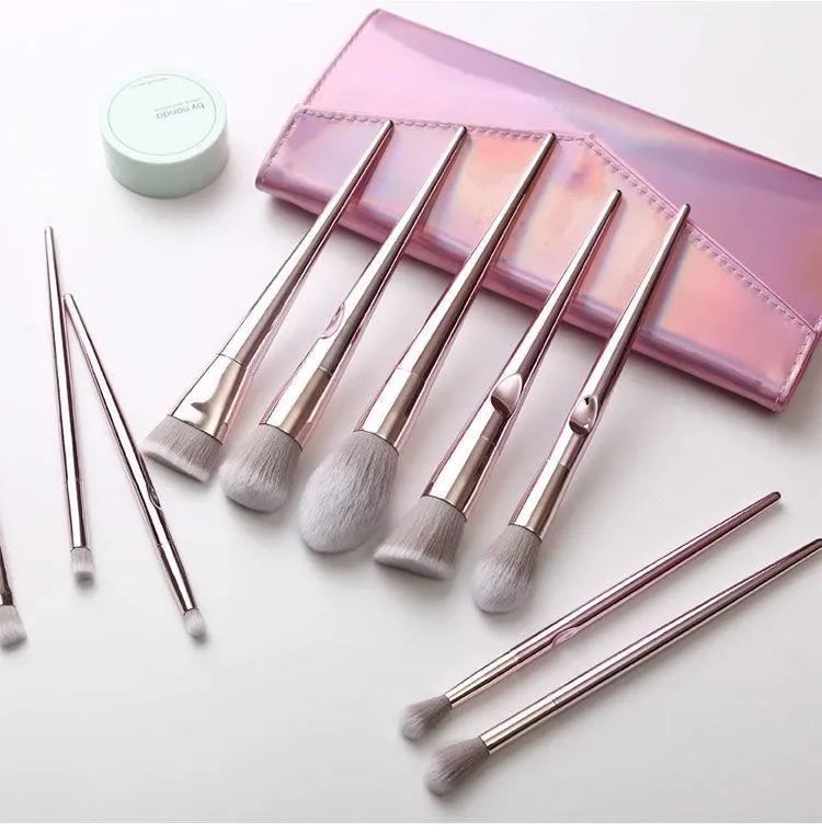 Pink PVC makeup brush set with non-slip grip handle and soft bristles on a light background