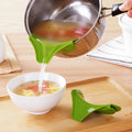 Green silicone kitchen funnel with curved design for clamping onto circular pot rims.