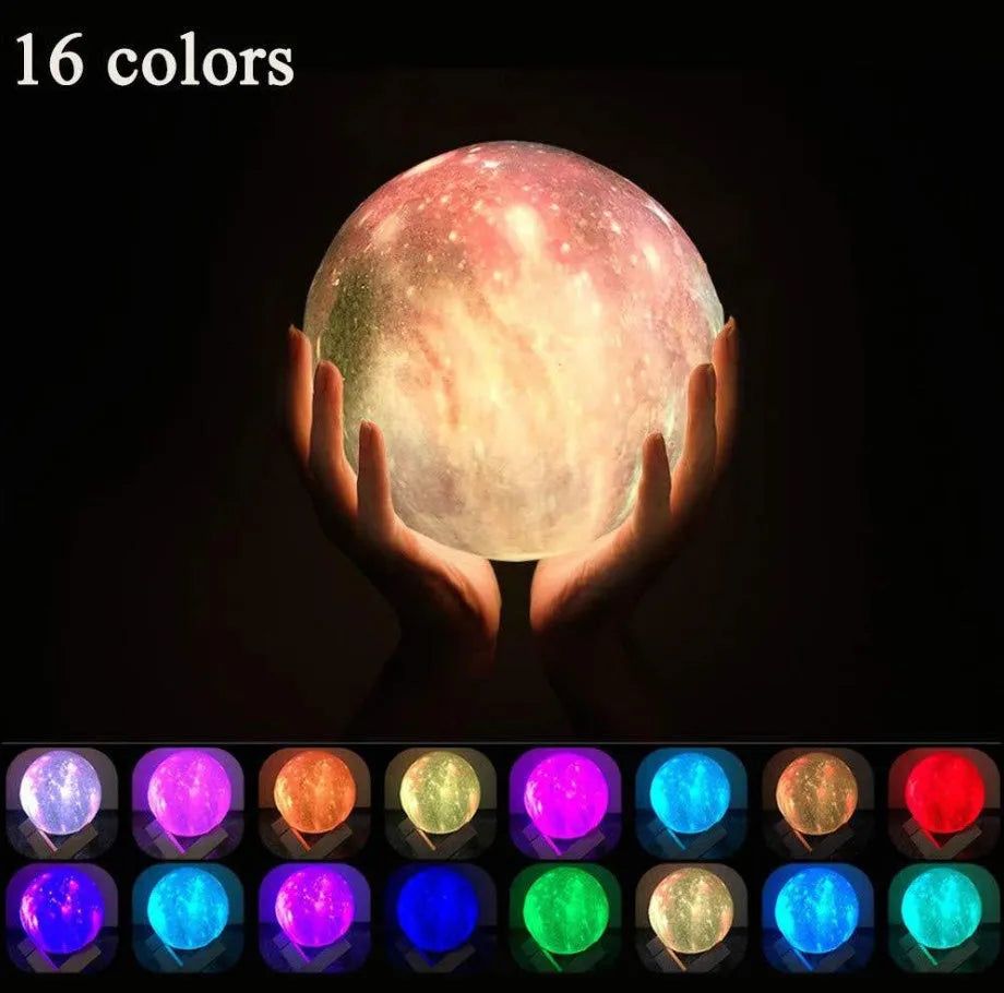 3D printed white moon lamp night light glowing on a surface next to its remote control.