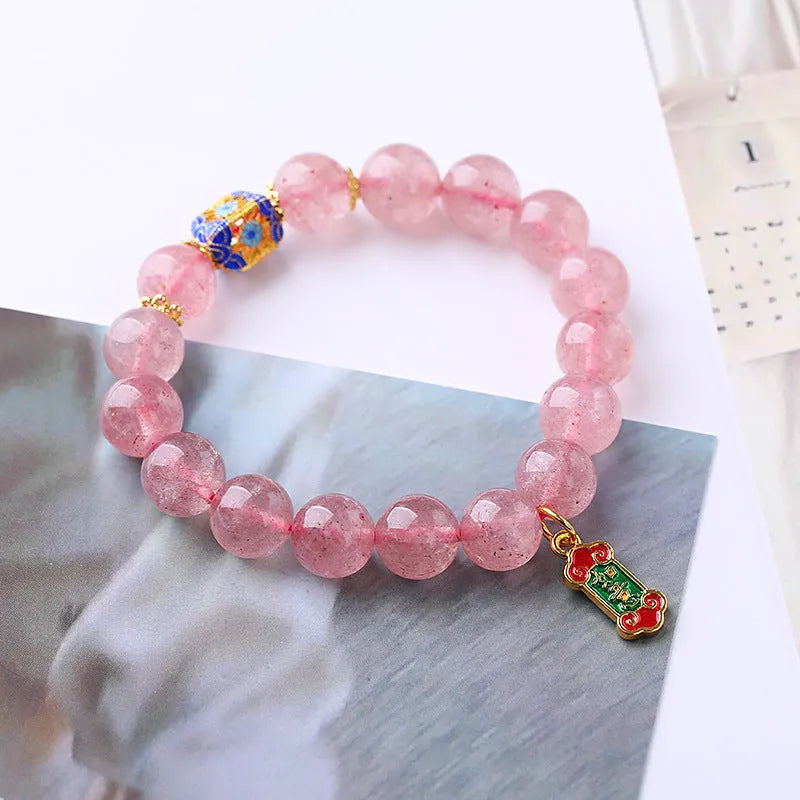 Pink Strawberry Quartz crystal bracelet with hand-woven construction and lucky national style design