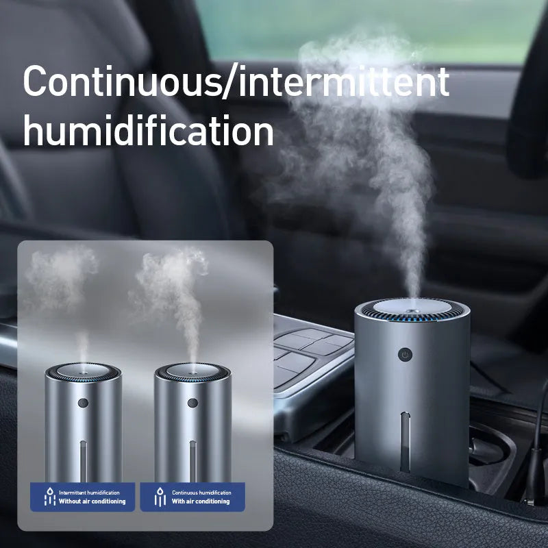 Black aluminium alloy car humidifier and air purifier with USB cable on a car dashboard.