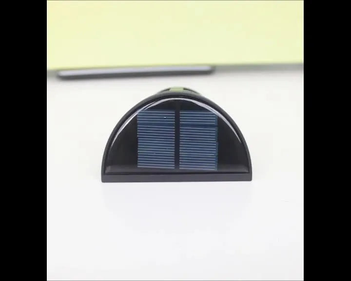 Solar-powered outdoor wall lamp with 6 LEDs and IP65 waterproof rating for garden lighting