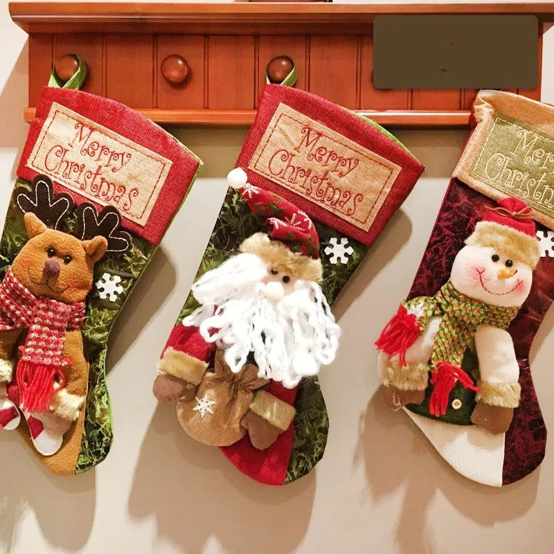 Handmade cloth Christmas stocking with 3D elk appliqué, large opening, and hanging loop.