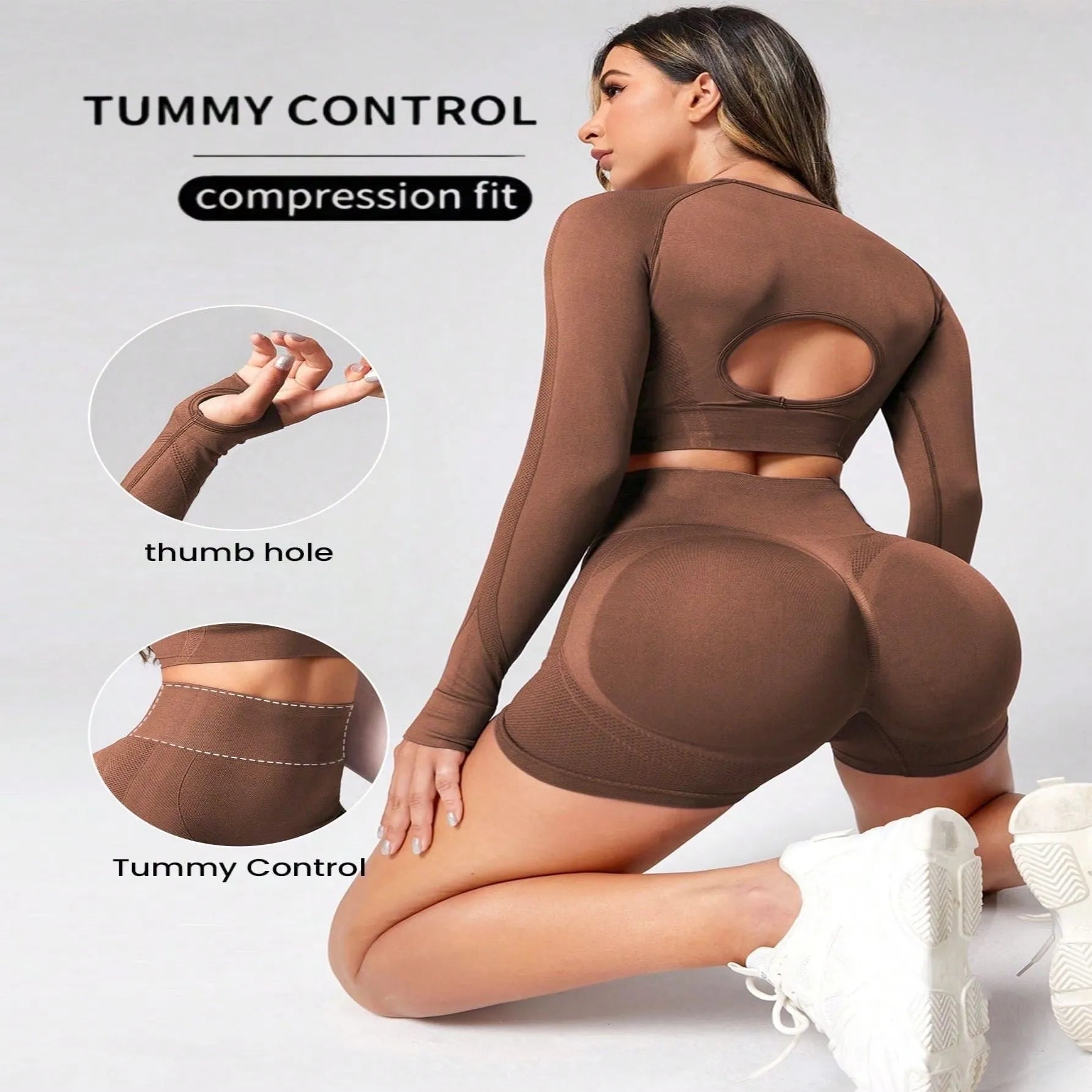 Women's high-waisted yoga suit set in black, featuring a long-sleeved top and tight leggings.