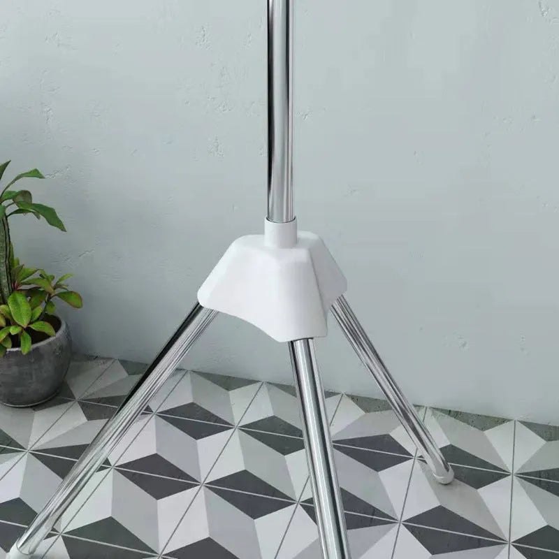 Three-layer stainless steel clothes drying rack with plastic clips for socks, ties, and trousers organisation