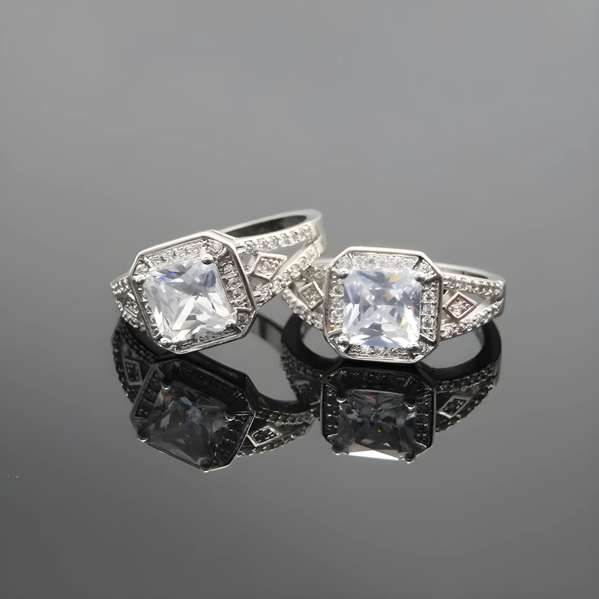 Women's platinum colour geometric zircon ring with hollow quadrilateral design on a copper band.