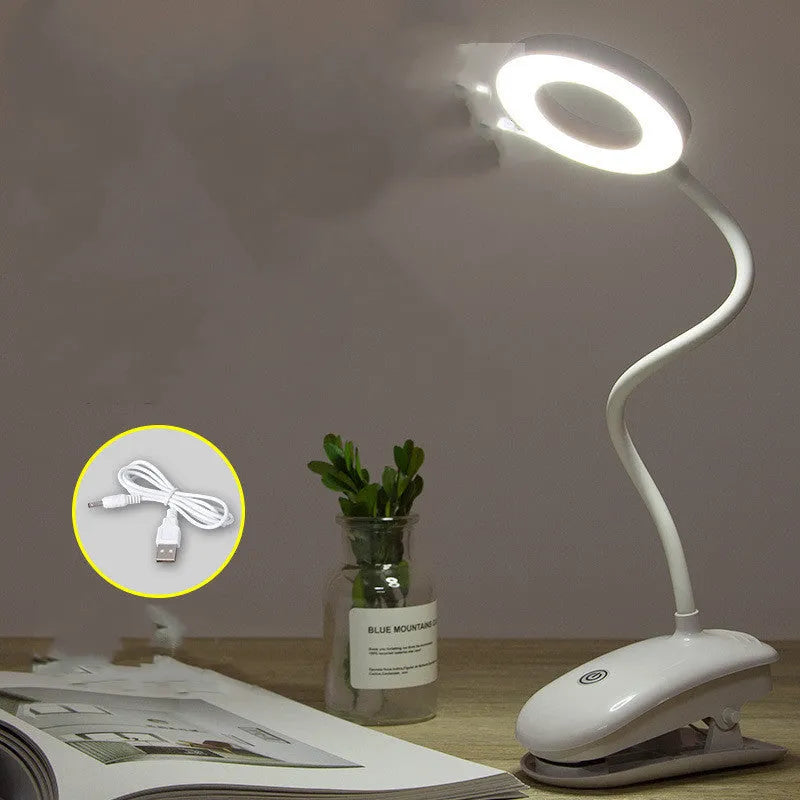 Clip-on rechargeable desk lamp with touch controls showing modern minimalist design