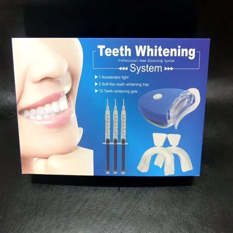 Bright Teeth Whitening Kit with LED cold light device and desensitizing gel syringes on a white background
