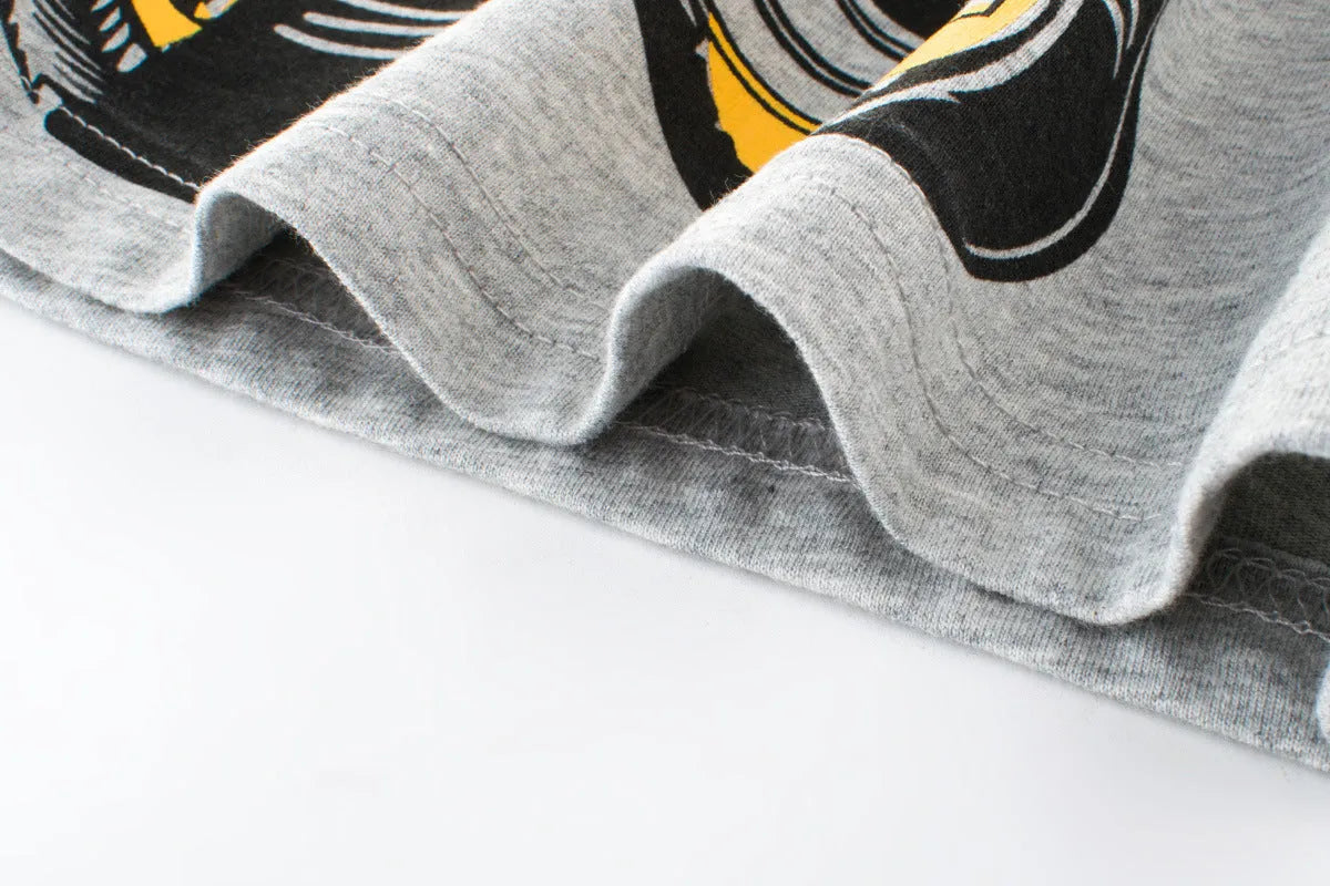 Children's light grey cartoon print cotton T-shirt with short sleeves and round neck.