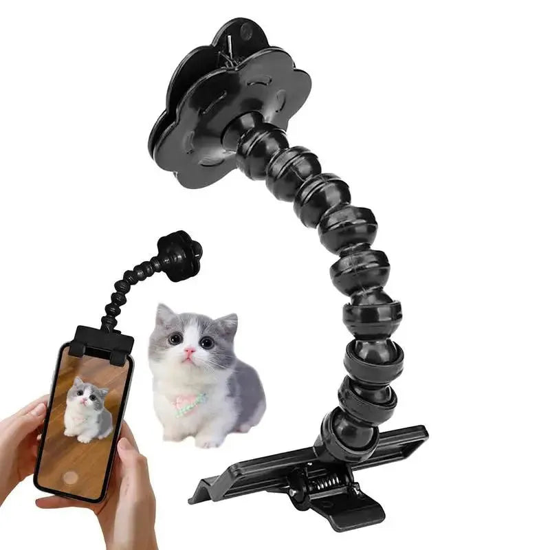 Pet photography tool clip for phone holding a treat to attract cat or dog attention, black plastic
