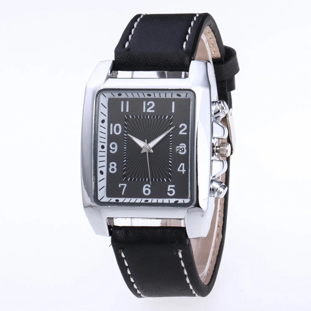 Men's quartz analog watch with metal case and brown leather band on wrist