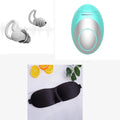 Hand-held oval sleep aid therapy instrument with matte texture in white, black, and green colours