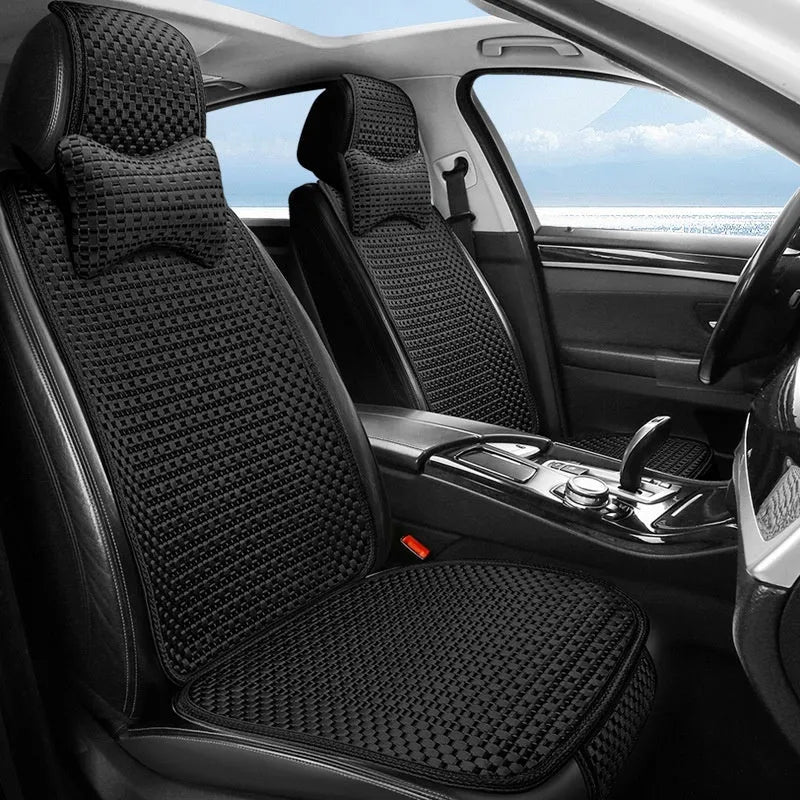 Ice silk car seat cushion in warm cream colour with flat minimalist design sitting on a car seat.