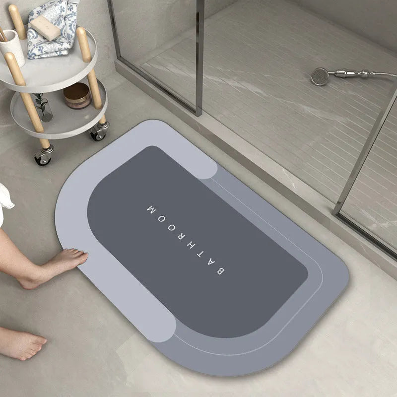 Baikal colour anti-slip bathroom floor mat in oval and rectangular shapes on tiled floor