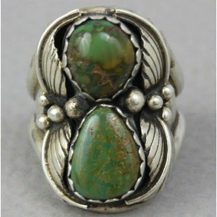 Women's geometric turquoise ring with electroplated alloy construction on finger