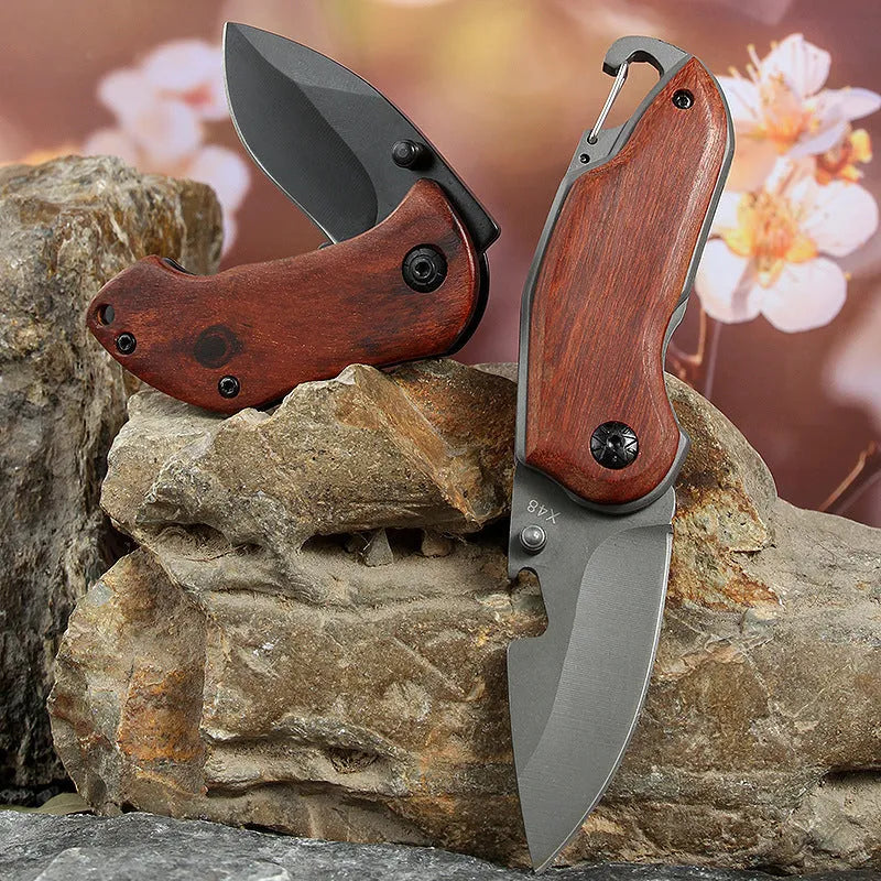 Stainless steel folding mini fruit knife with red handle and 5.5cm blade on keychain