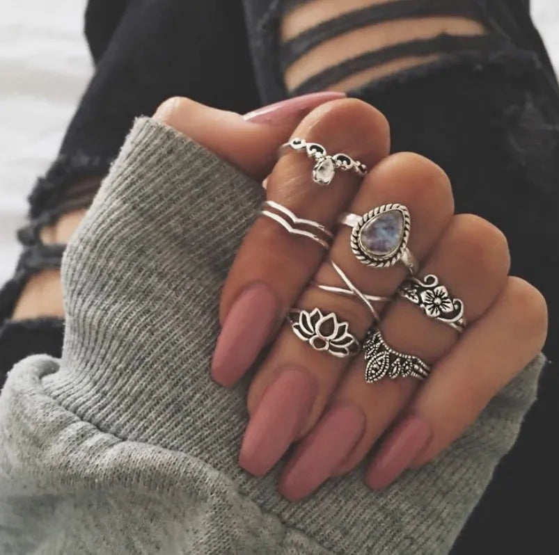 Vintage knuckle rings set with gold, silver, black and turquoise elephant, lotus, moon and flower designs