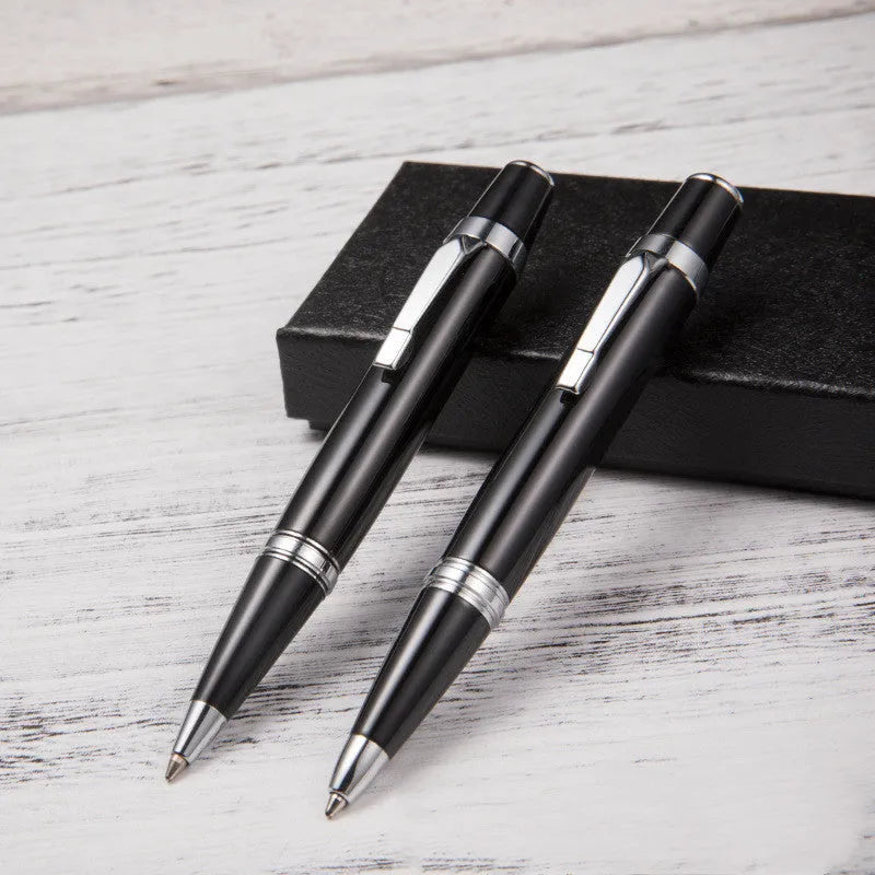 Short black metal ballpoint pen with rotating mechanism showing 112mm length and 12.5mm diameter