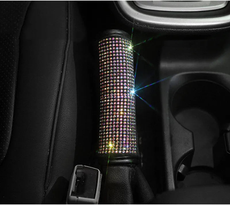 Four piece car interior accessory set with rhinestone crystals, including steering wheel, gear shift, handbrake and seat belt covers