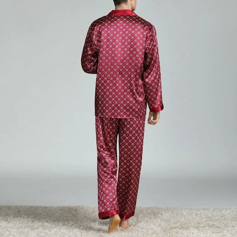Men's red and blue printed imitation silk pajama suit with lapel collar, long sleeves, and trousers on a model
