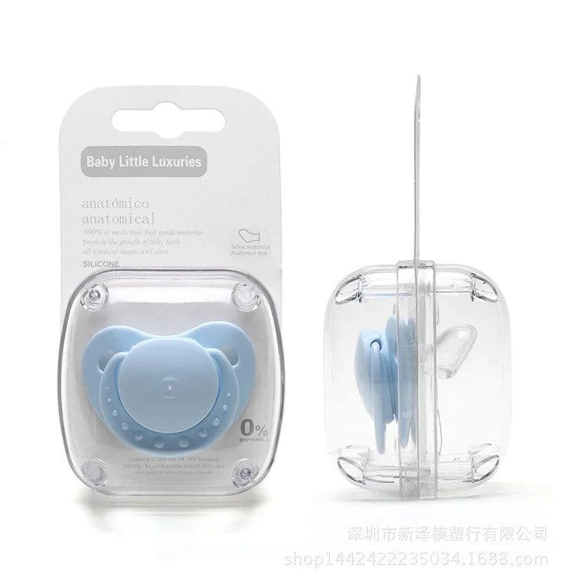 Soft silicone baby pacifier in beige on white background, size S, box packaging