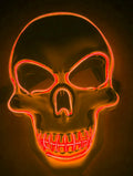 Halloween LED glow skeleton mask in blue with moulded plastic face fit and clip-on battery pack